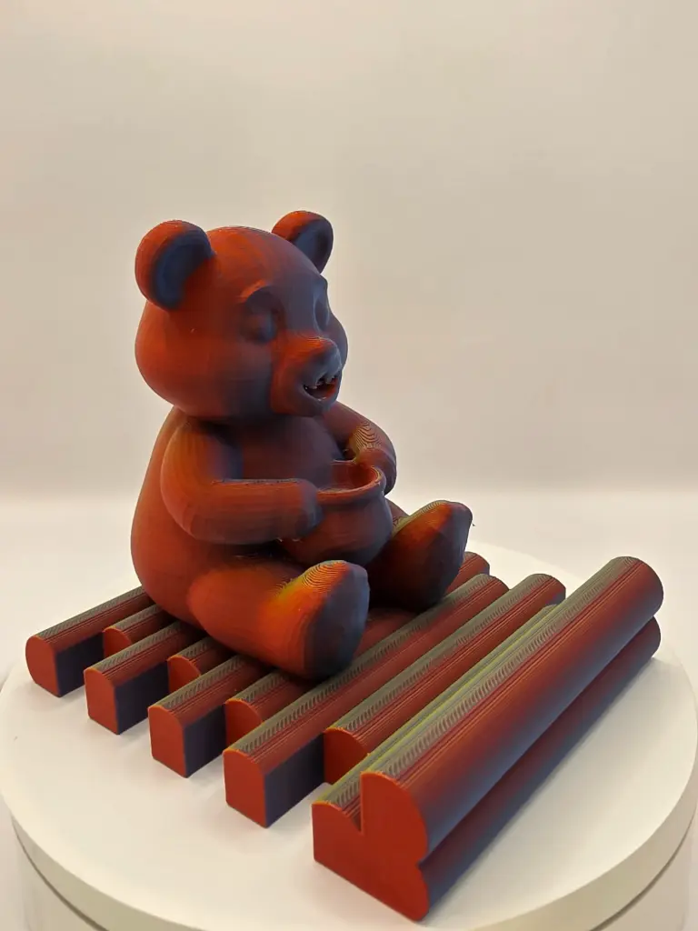 Support de téléphone Ours orange bleu vert