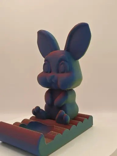 Lapin orange bleu vert